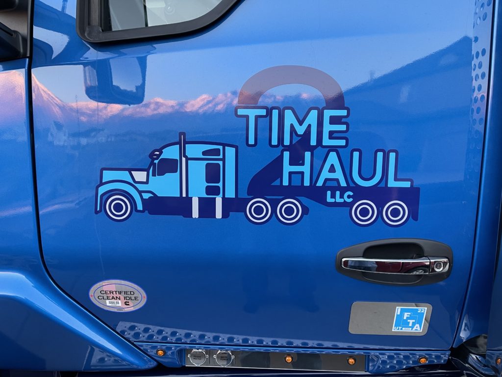 Time 2 Haul truck logo written at the door