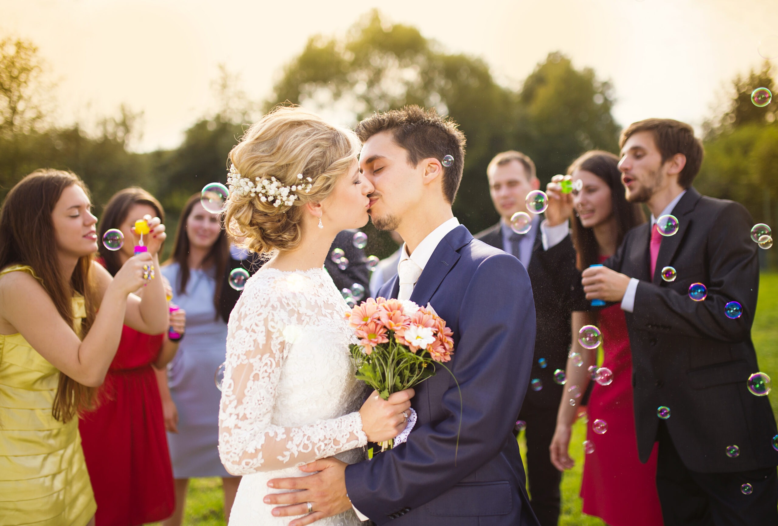 Young Newlyweds Kissing and Enjoying Romantic Moment Together